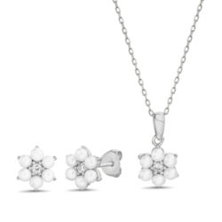 Conjunto y par de aros , flor con perlas
